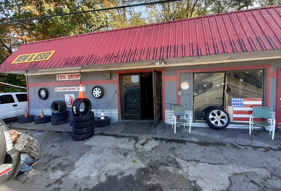 Redline Tire’s red-roof neighborhood shop on Charlotte Pike in Nashville